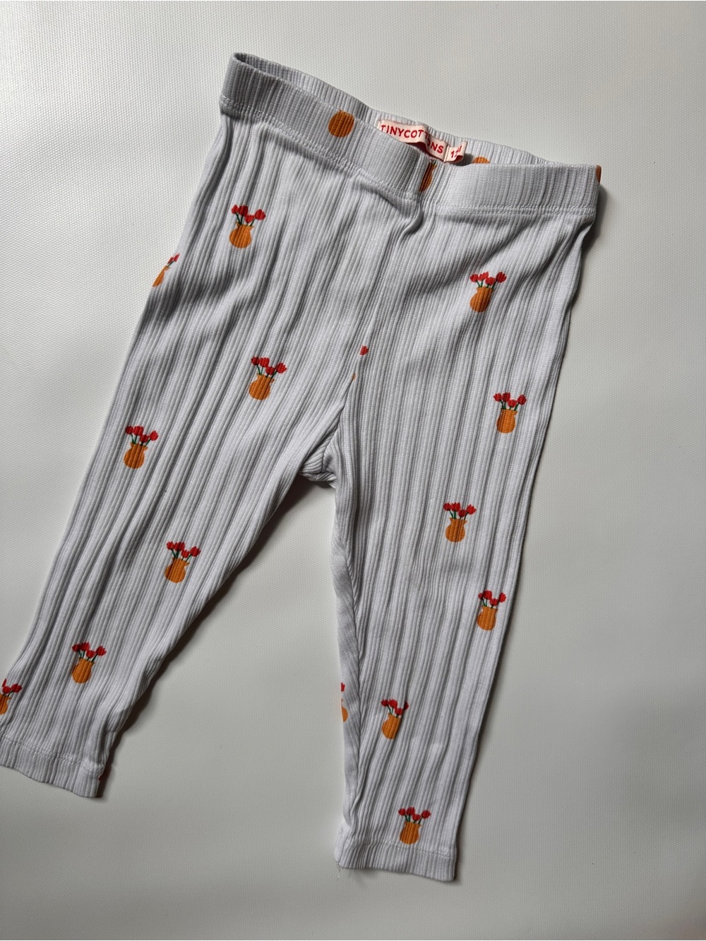 Tinycottons White Ribbed Baby Leggings with Orange Floral Motif